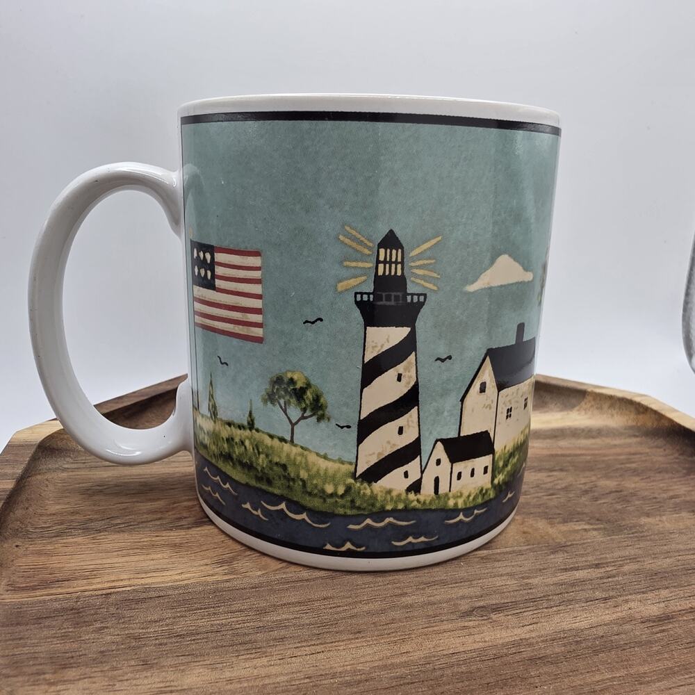 Warren Kimble Sakura Coastal Breeze Lighthouse Coffee Mug Oneida Stoneware